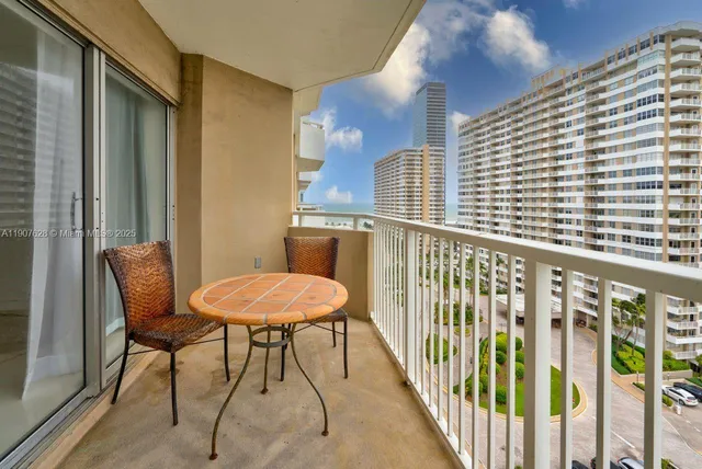 a view of a dining room and chandelier