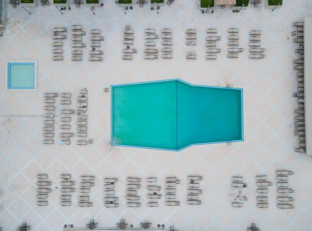 a kitchen with stainless steel appliances a stove and a microwave