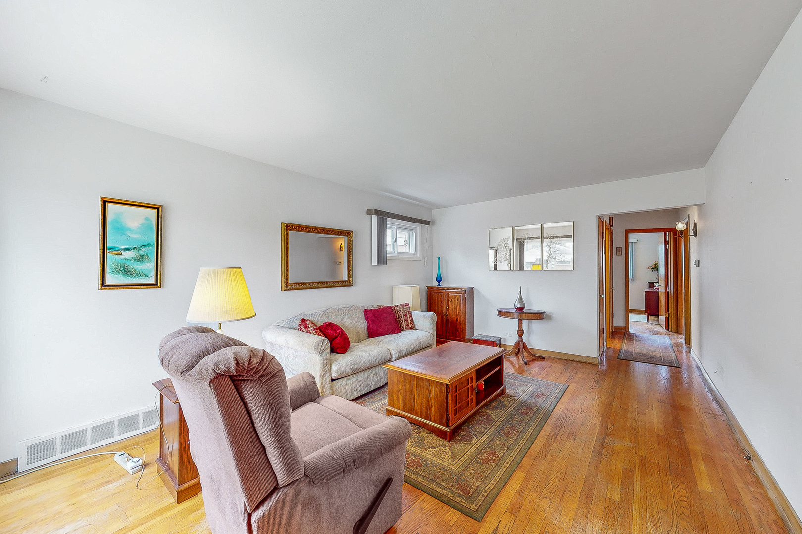 6923 29th Street Berwyn, IL 60402 - Photo 2 of 23 a living room with furniture and a wooden floor