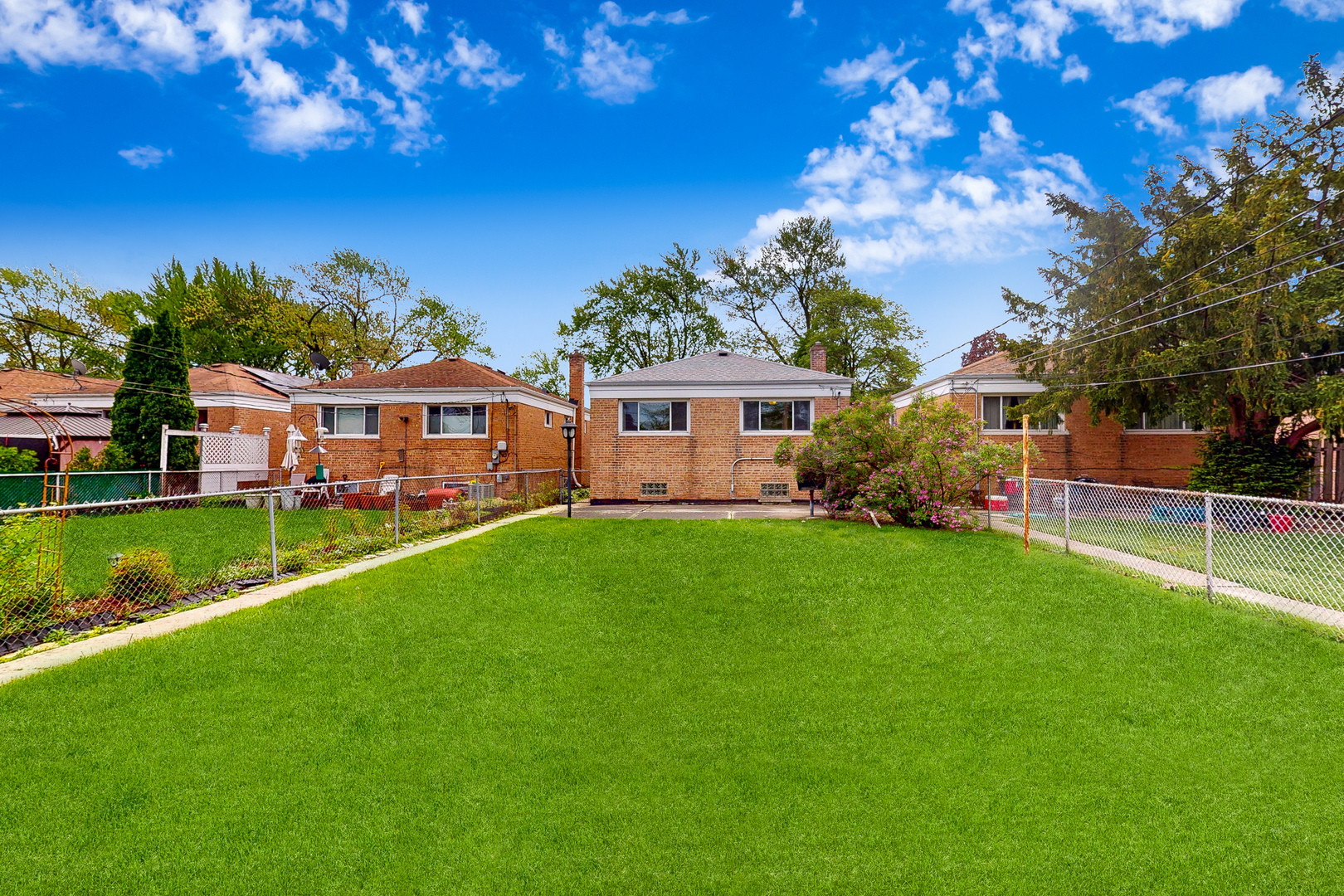 6923 29th Street Berwyn, IL 60402 - Photo 22 of 23 a view of a house with a big yard