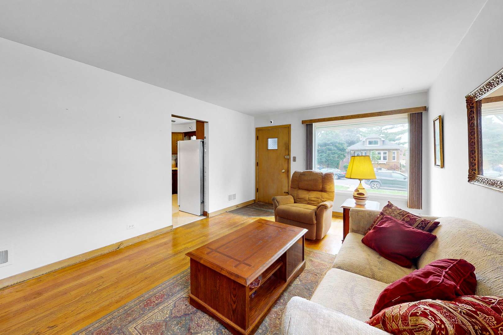 6923 29th Street Berwyn, IL 60402 - Photo 3 of 23 a living room with furniture and window