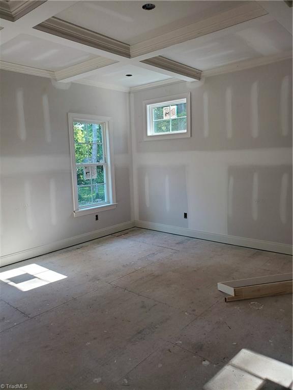 639 Ransom Road Winston-Salem, NC 27106 - Photo 6 of 8 Master Bedroom with coffered ceiling and wonderful wooded views