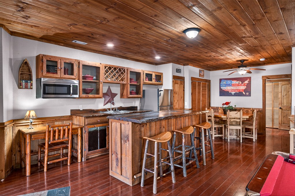 40 Adelaide Trail Blue Ridge, GA 30513 - Photo 23 of 32 a view of a dining room with furniture wooden floor and chandelier