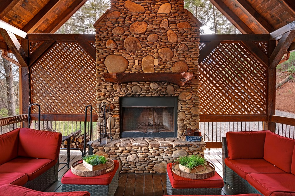 40 Adelaide Trail Blue Ridge, GA 30513 - Photo 8 of 32 a outdoor living space with furniture and a fireplace