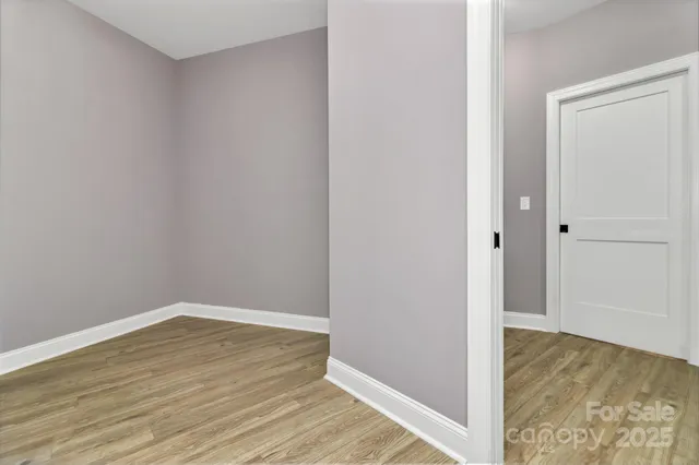 a view of small space with wooden floor