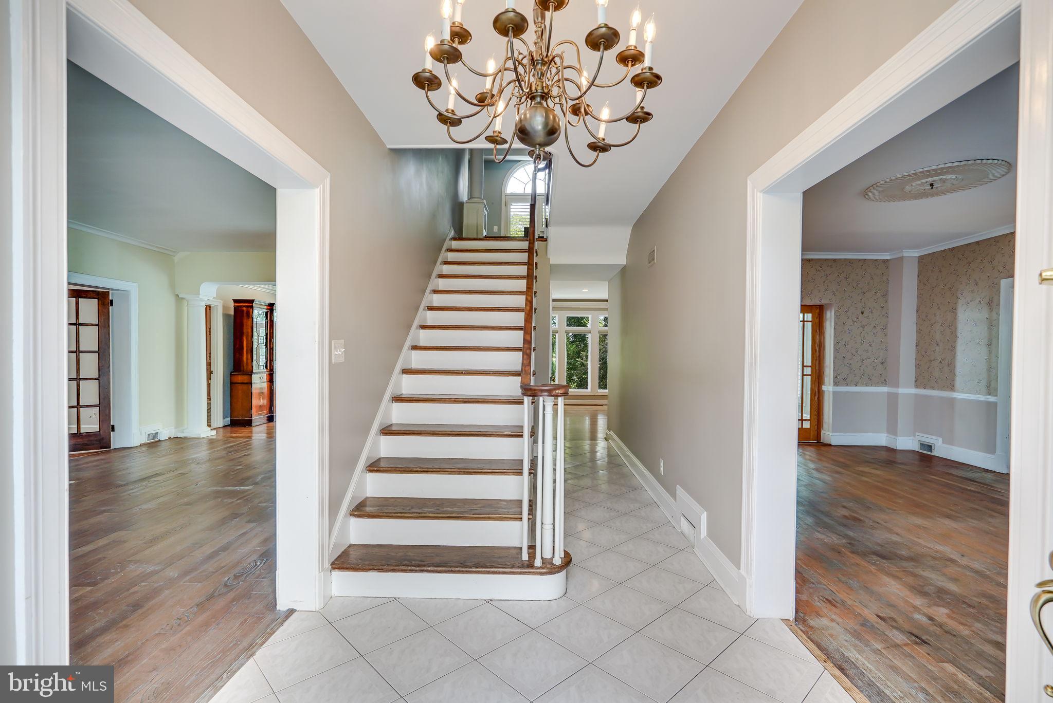 1607 South Arlington Ridge Road Arlington, VA 22202 - Photo 5 of 80 Enter gracious foyer from Portico. DR - R, LR - L