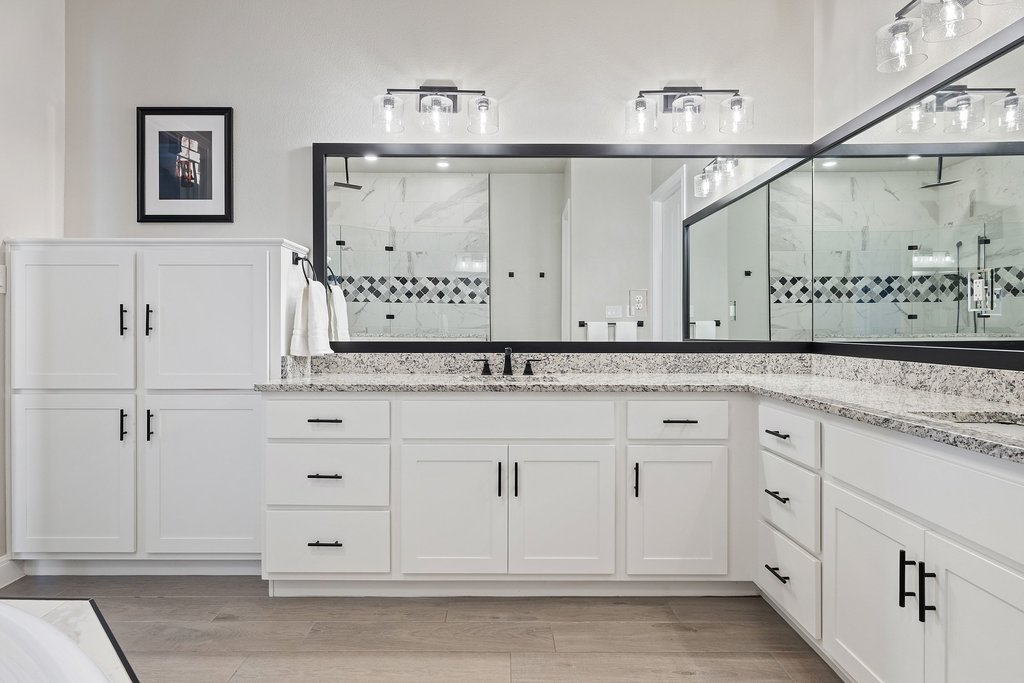 1006 Woodpark Lane Georgetown, TX 78633 - Photo 15 of 27 a bathroom with a sink and a mirror