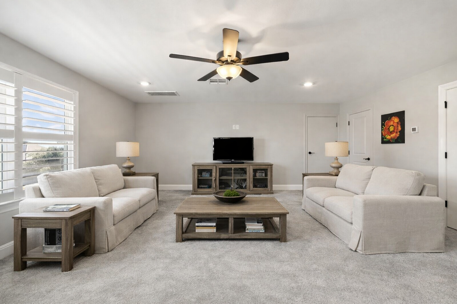 1006 Woodpark Lane Georgetown, TX 78633 - Photo 20 of 27 a living room with furniture a flat screen tv and a window