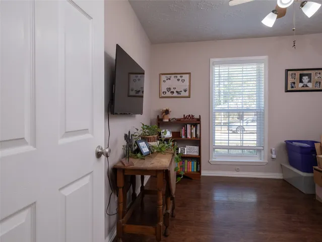 a workspace with furniture and wooden floor