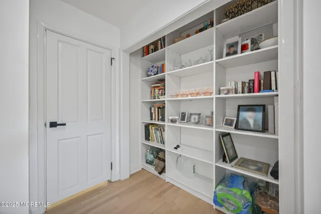a room with a book shelf