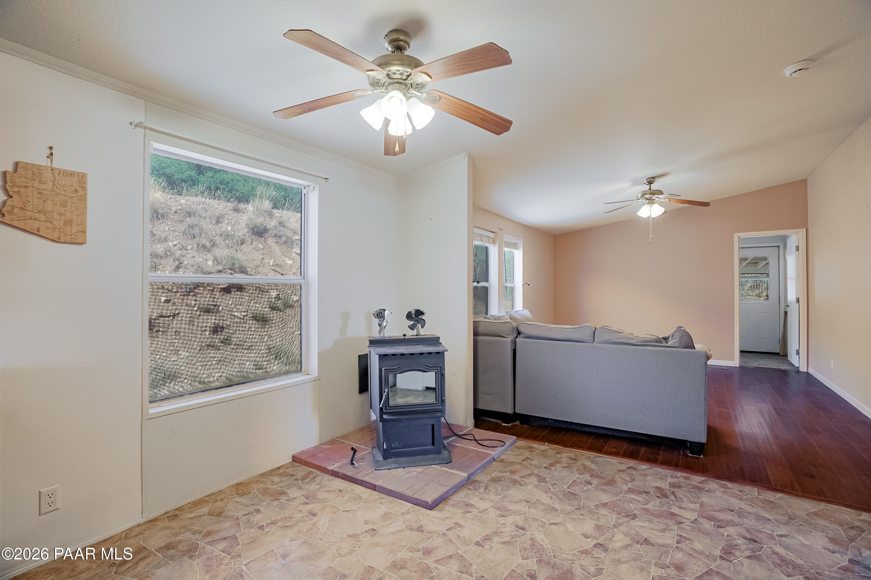11800 Henderson Road Dewey-Humboldt, AZ 86327 - Photo 12 of 54 a living room with furniture and wooden floor