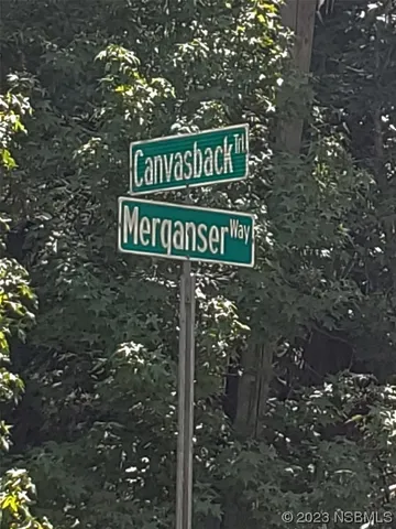 a street sign that is sitting on a pole