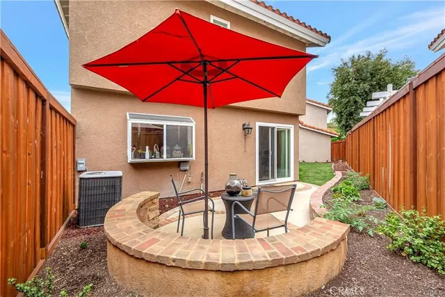 a view of a house with porch and sitting area