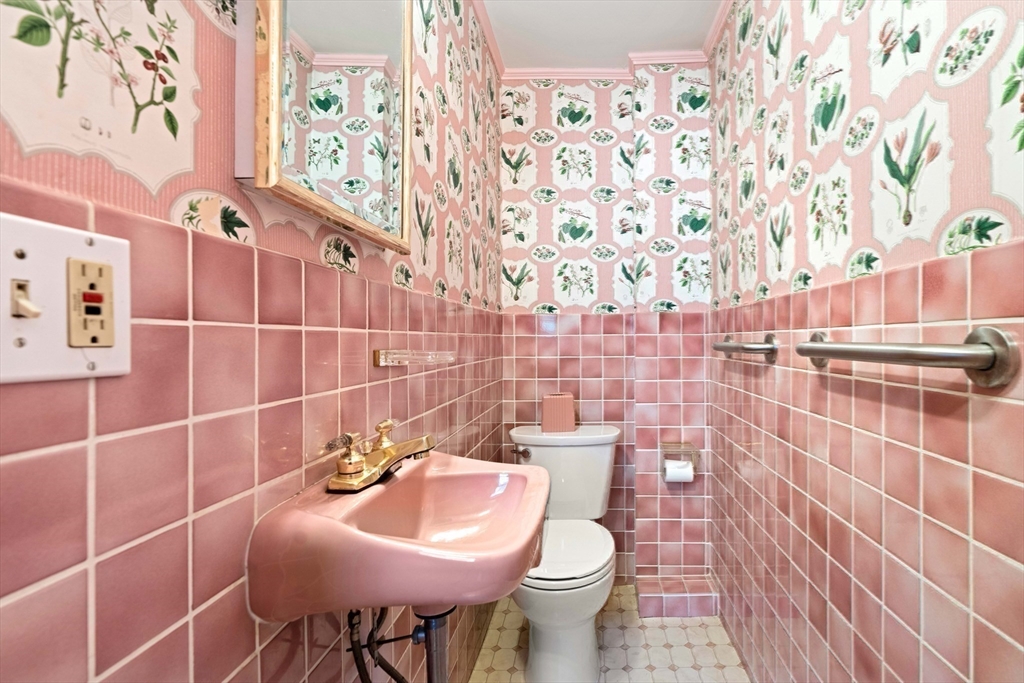 4 Prince Street Marblehead, MA 01945 - Photo 17 of 27 a bathroom with a sink toilet and shower