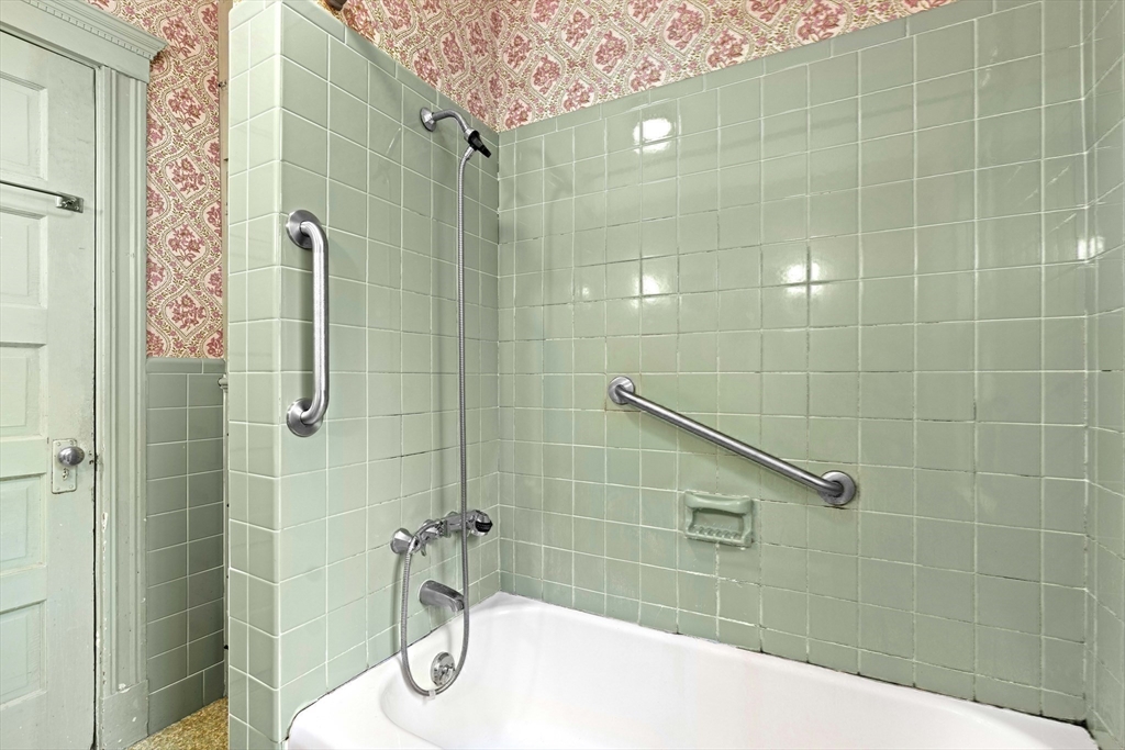 4 Prince Street Marblehead, MA 01945 - Photo 23 of 27 a bathroom with a shower
