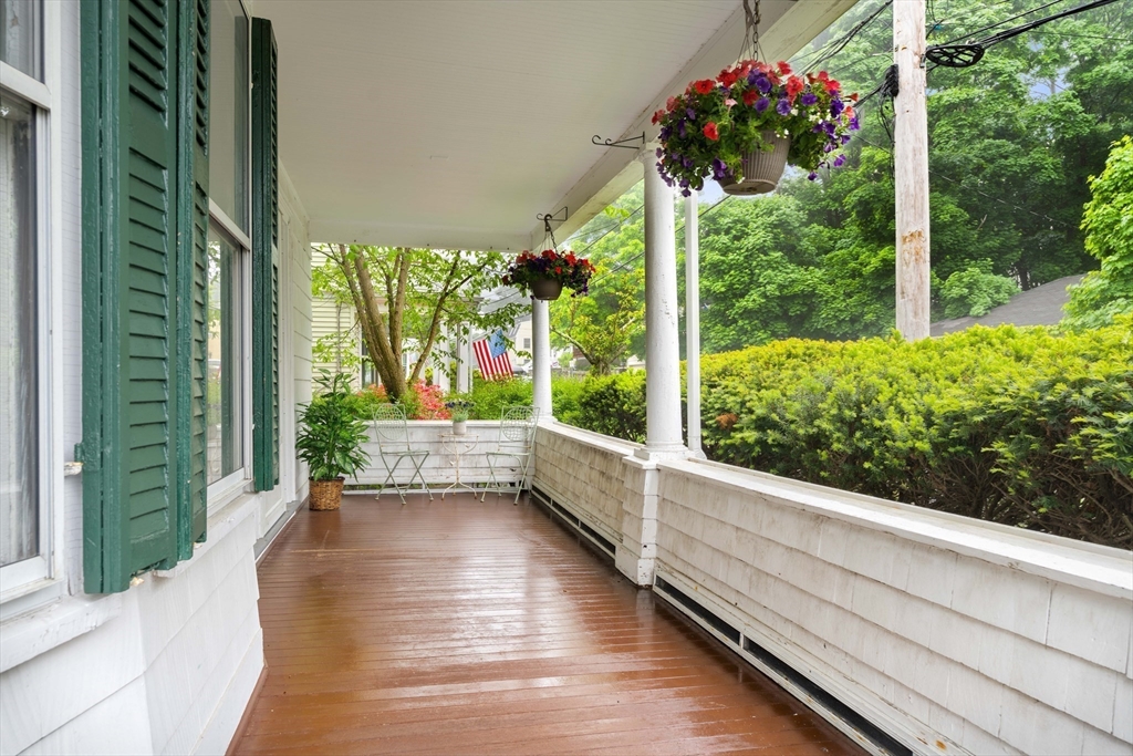 4 Prince Street Marblehead, MA 01945 - Photo 3 of 27 a view of a garden with plants