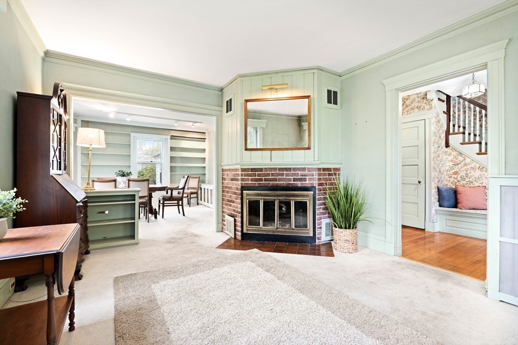 4 Prince Street Marblehead, MA 01945 - Photo 6 of 27 a living room with furniture and a fireplace
