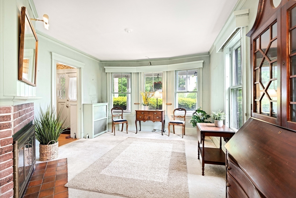 4 Prince Street Marblehead, MA 01945 - Photo 7 of 27 a living room with furniture and a window