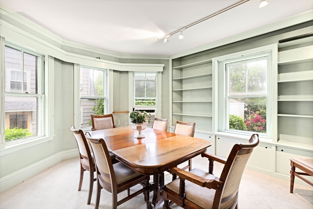 4 Prince Street Marblehead, MA 01945 - Photo 10 of 27 a view of a dining room with furniture and a window
