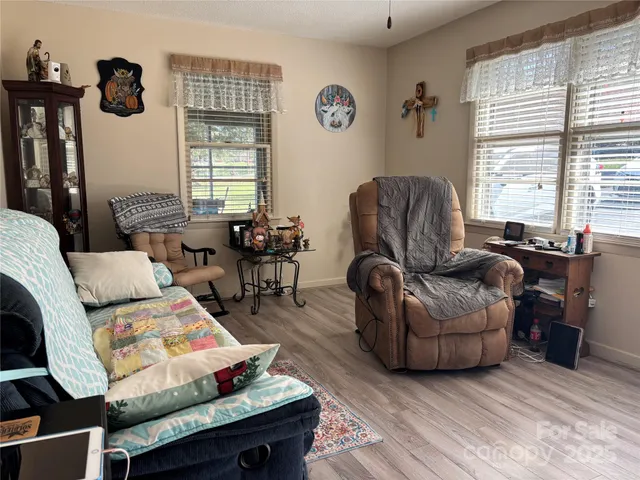 a living room with furniture and a window