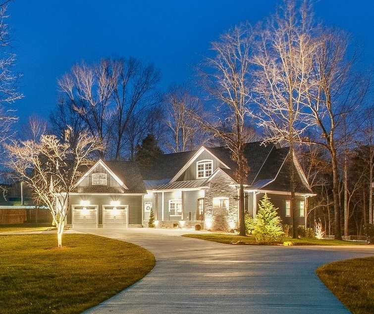 a view of an house with snow and trees