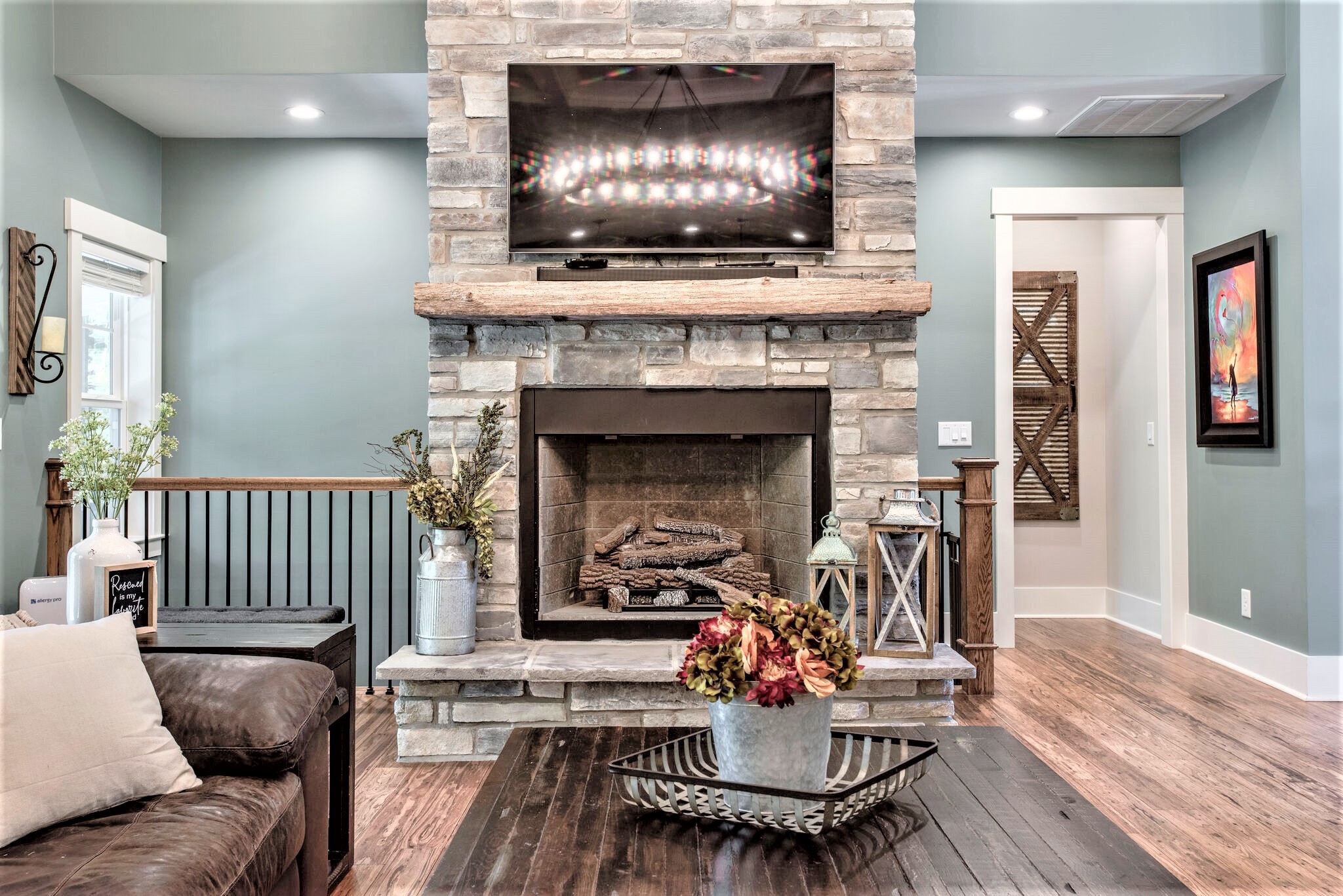1387 Camp Ravine Road Burns, TN 37029 - Photo 14 of 49 a living room with furniture and a fireplace