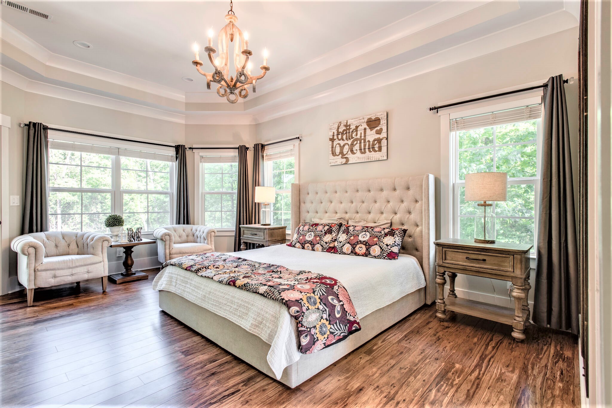 1387 Camp Ravine Road Burns, TN 37029 - Photo 19 of 49 a bedroom with a large bed and a couch