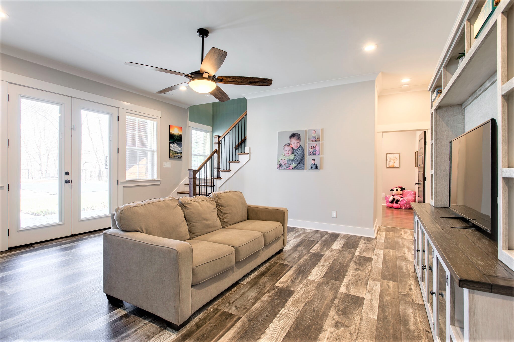 1387 Camp Ravine Road Burns, TN 37029 - Photo 29 of 49 a living room with furniture and a flat screen tv