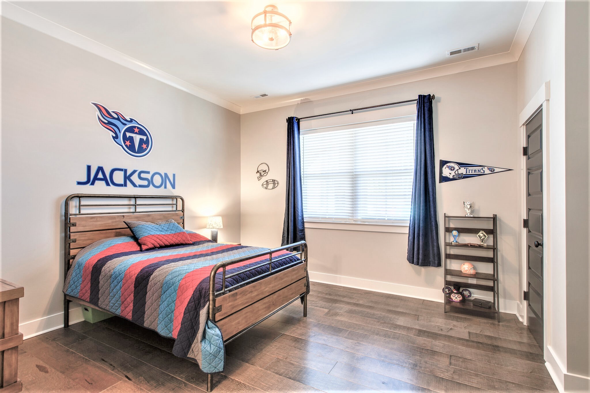 1387 Camp Ravine Road Burns, TN 37029 - Photo 30 of 49 a bedroom with a bed and a window