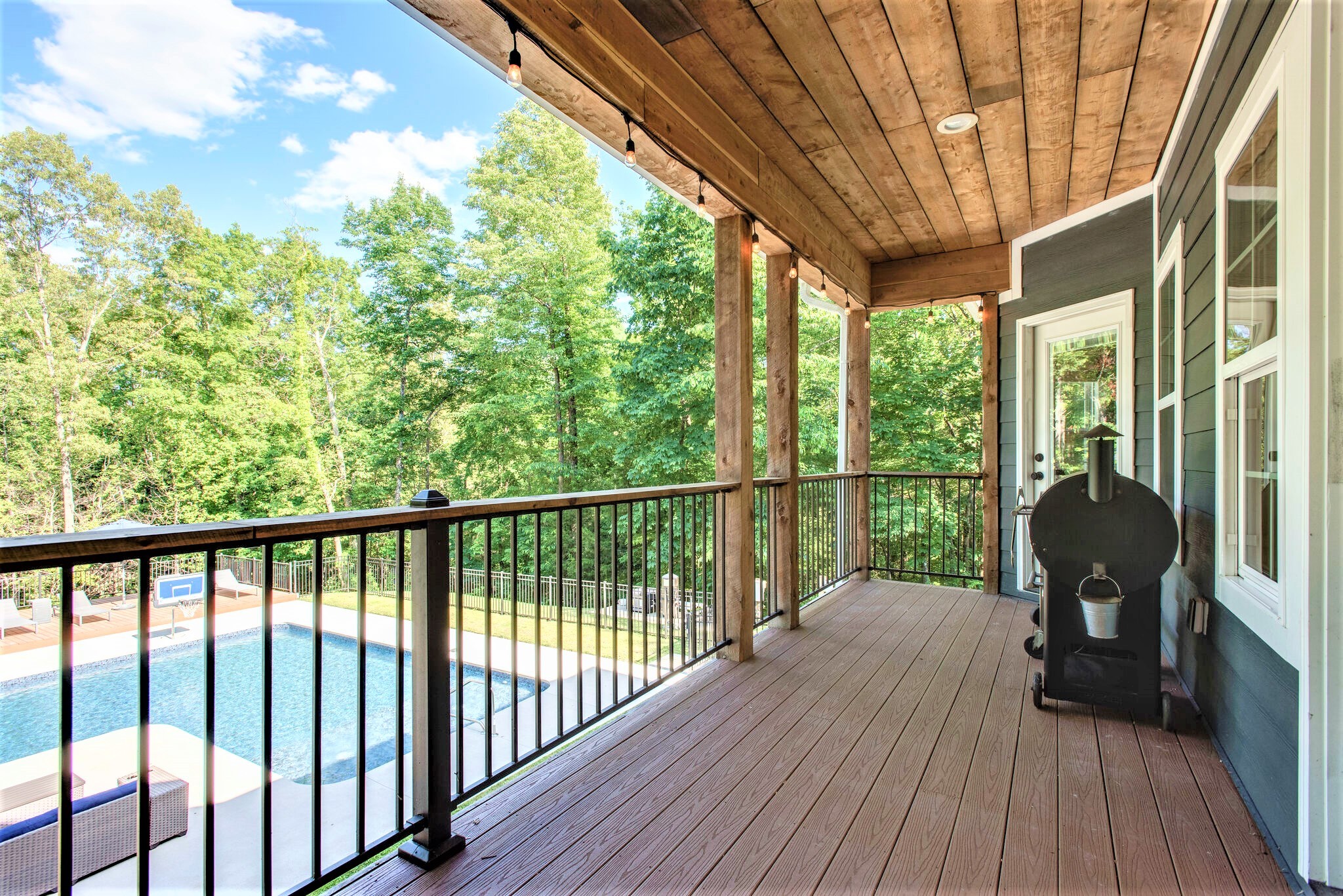 1387 Camp Ravine Road Burns, TN 37029 - Photo 35 of 49 a view of balcony with wooden floor