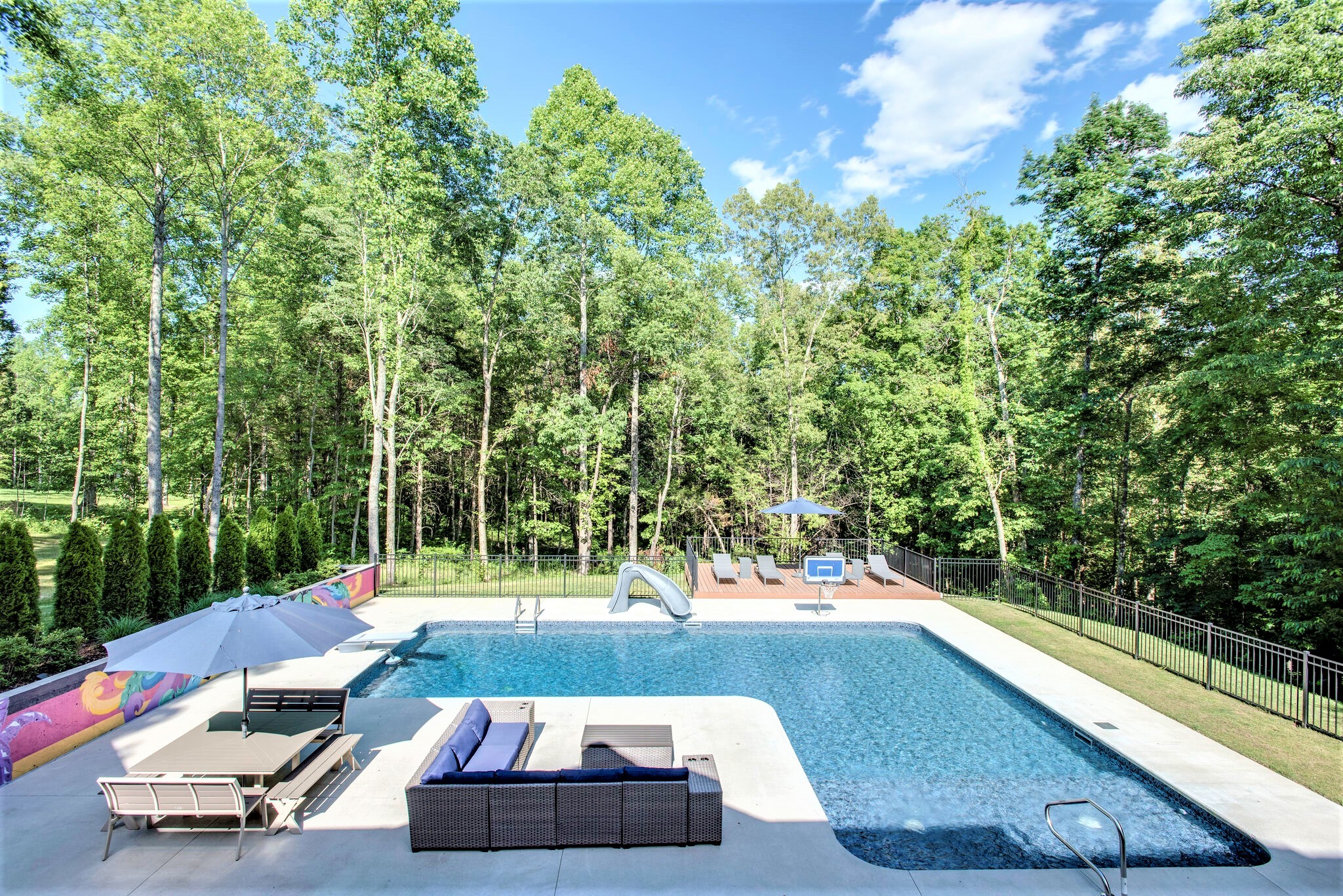 1387 Camp Ravine Road Burns, TN 37029 - Photo 36 of 49 a view of a swimming pool with a patio