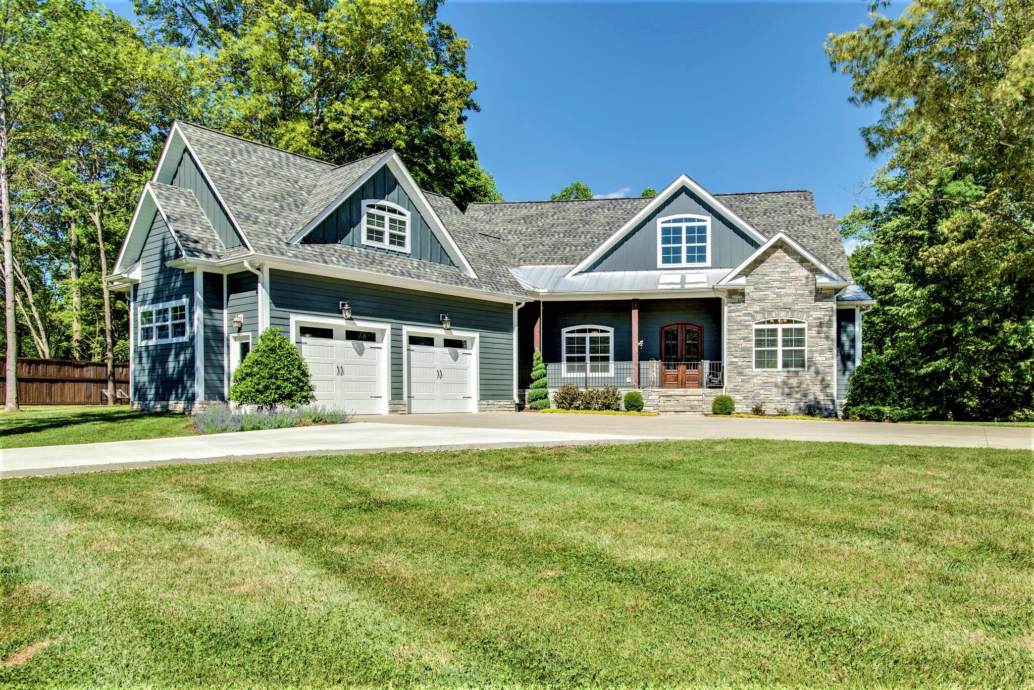 1387 Camp Ravine Road Burns, TN 37029 - Photo 6 of 49 a front view of a house with swimming pool having outdoor seating