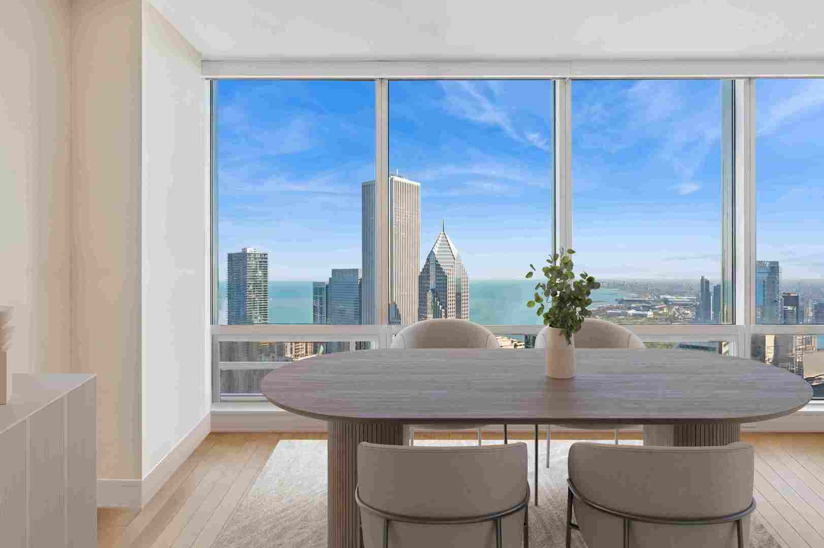 401 North Wabash Avenue, Unit 57F Chicago, IL 60611 - Photo 6 of 45 a dining room with furniture and wooden floor