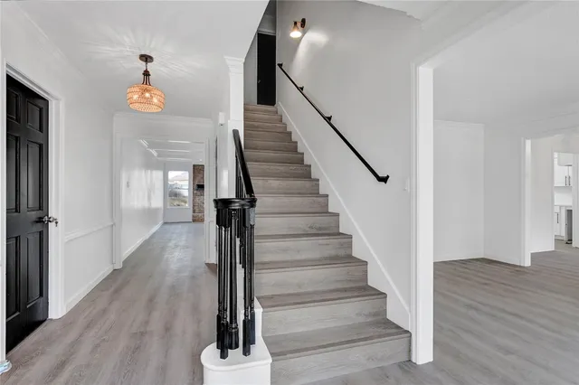 a view of entryway with wooden floor