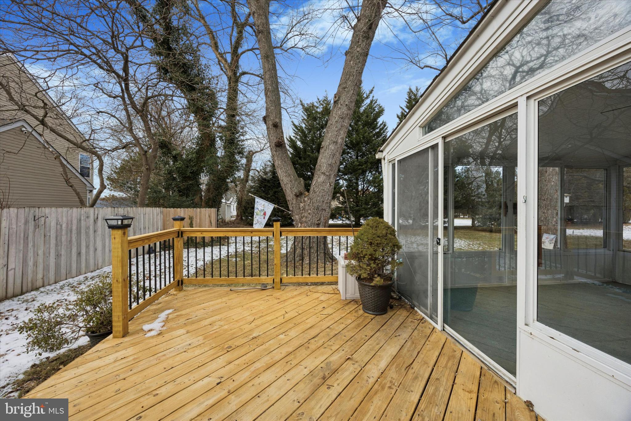 713 Scott Lane Wallingford, PA 19086 - Photo 32 of 34 Sunny deck with serene backyard views.