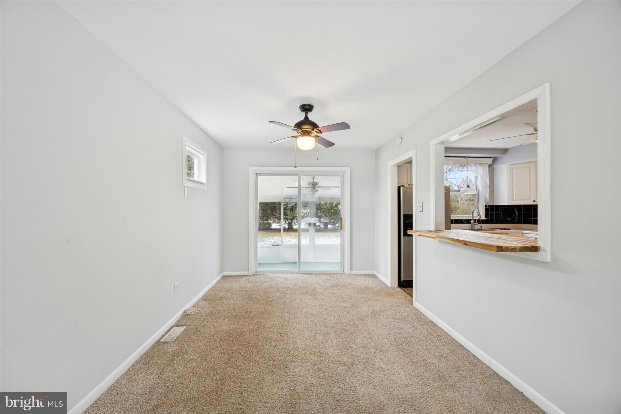 713 Scott Lane Wallingford, PA 19086 - Photo 7 of 34 Dining room with sliders to the sunroom