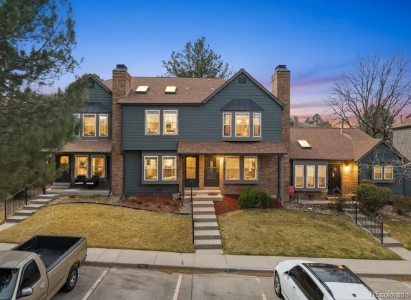 a front view of a house with swimming pool