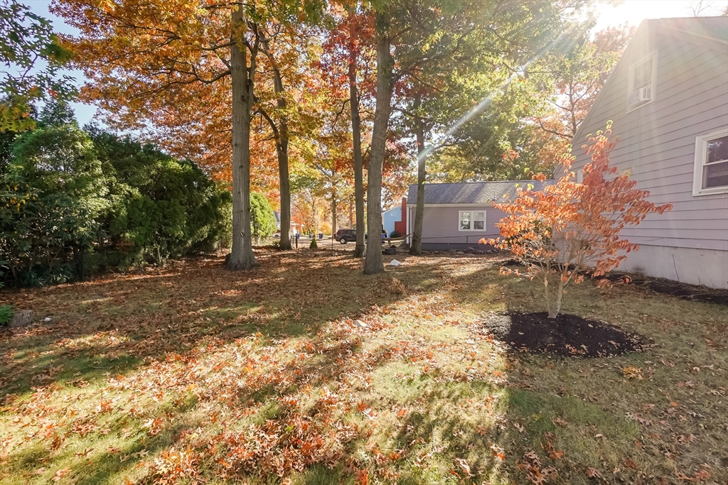 5 Oliver Street Randolph, MA 02368 - Photo 9 of 29 a view of a house with a yard