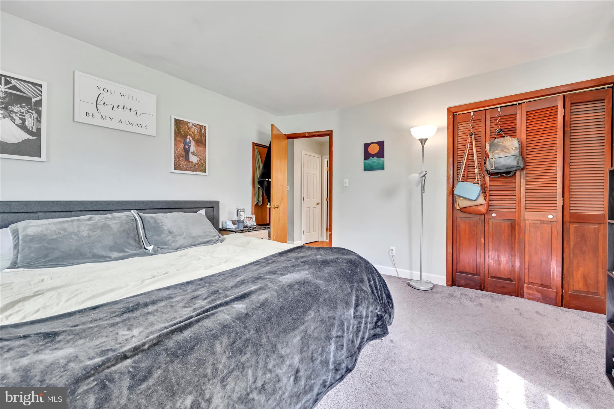 85 Gernants Church Road Leesport, PA 19533 - Photo 16 of 43 a bedroom with a large bed and wooden floor