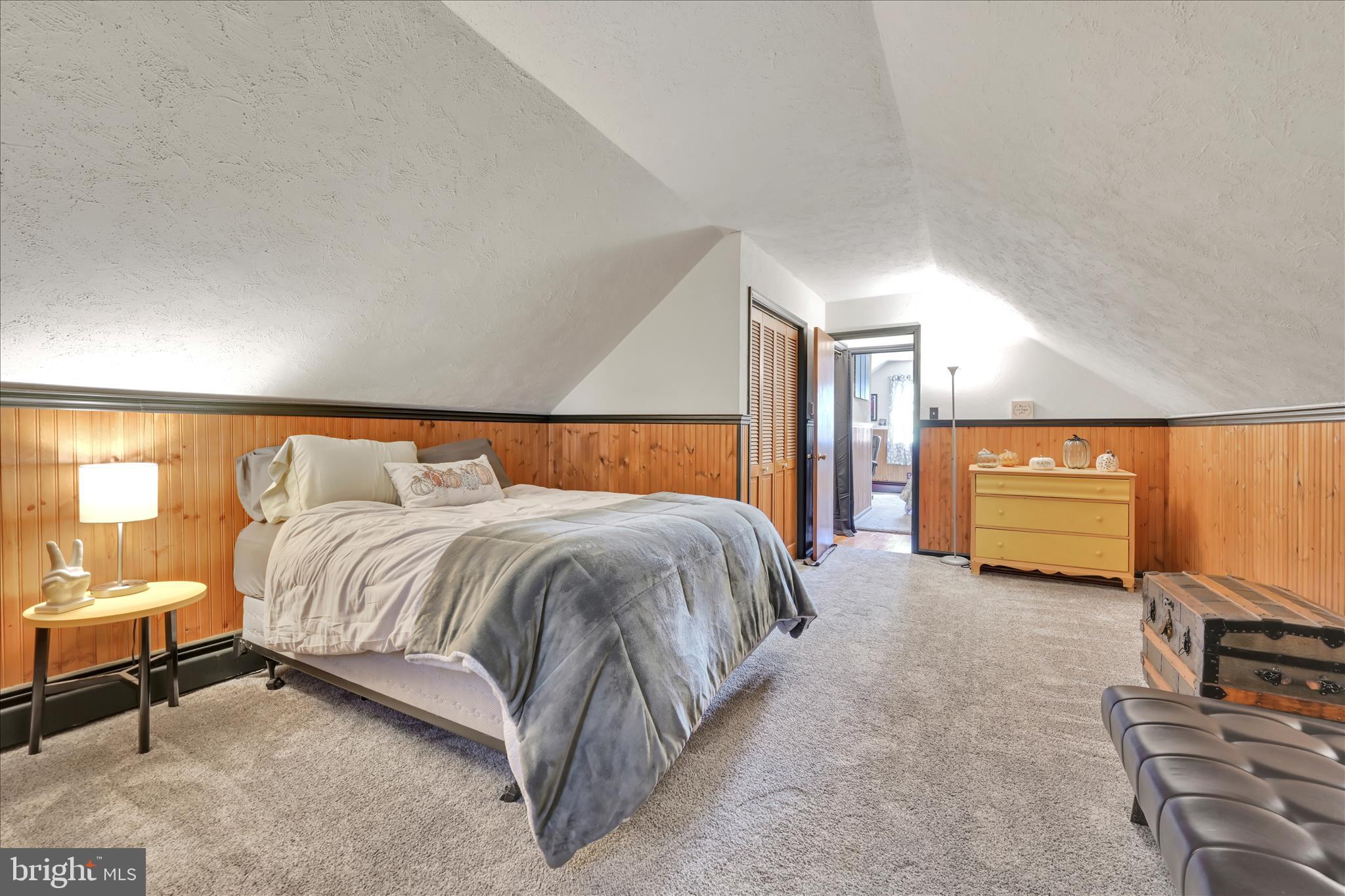 85 Gernants Church Road Leesport, PA 19533 - Photo 21 of 43 a bedroom with a bed and a couch