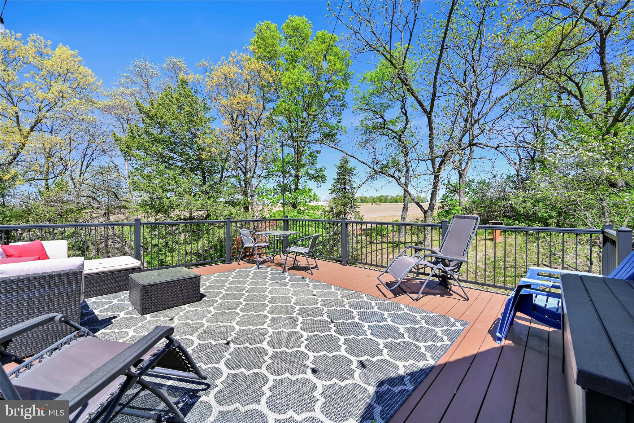 85 Gernants Church Road Leesport, PA 19533 - Photo 23 of 43 a view of a patio with couches table and chairs and wooden floor