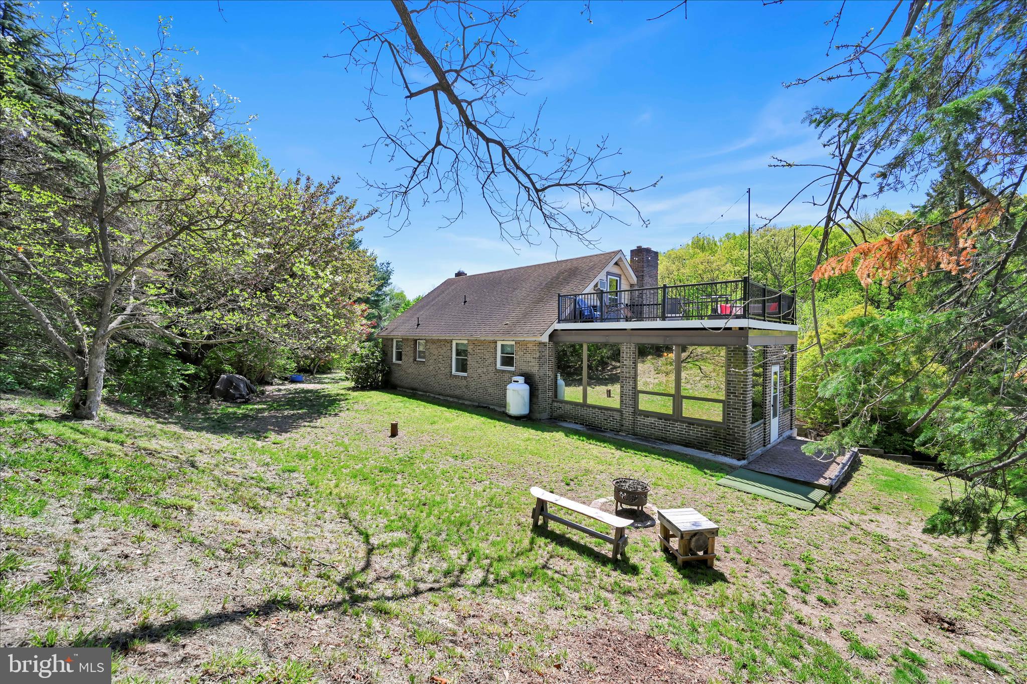85 Gernants Church Road Leesport, PA 19533 - Photo 34 of 43 a view of a house with backyard sitting area and garden