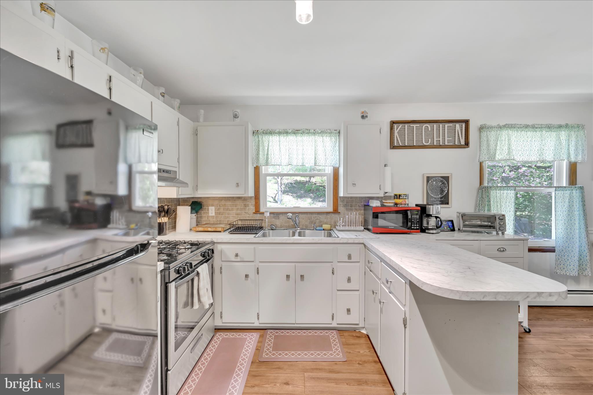 85 Gernants Church Road Leesport, PA 19533 - Photo 7 of 43 a kitchen with a sink stove and cabinets