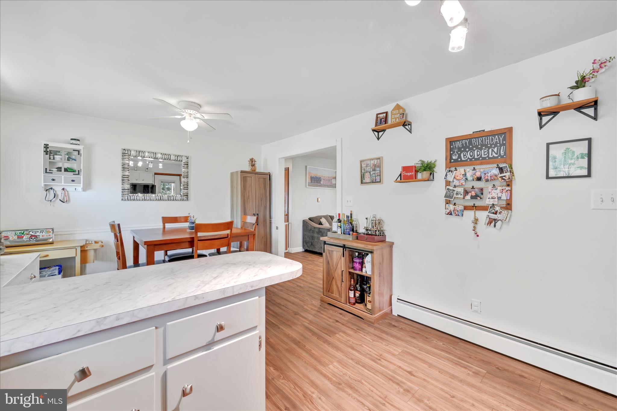 85 Gernants Church Road Leesport, PA 19533 - Photo 9 of 43 a view of a living room with furniture and wooden floor