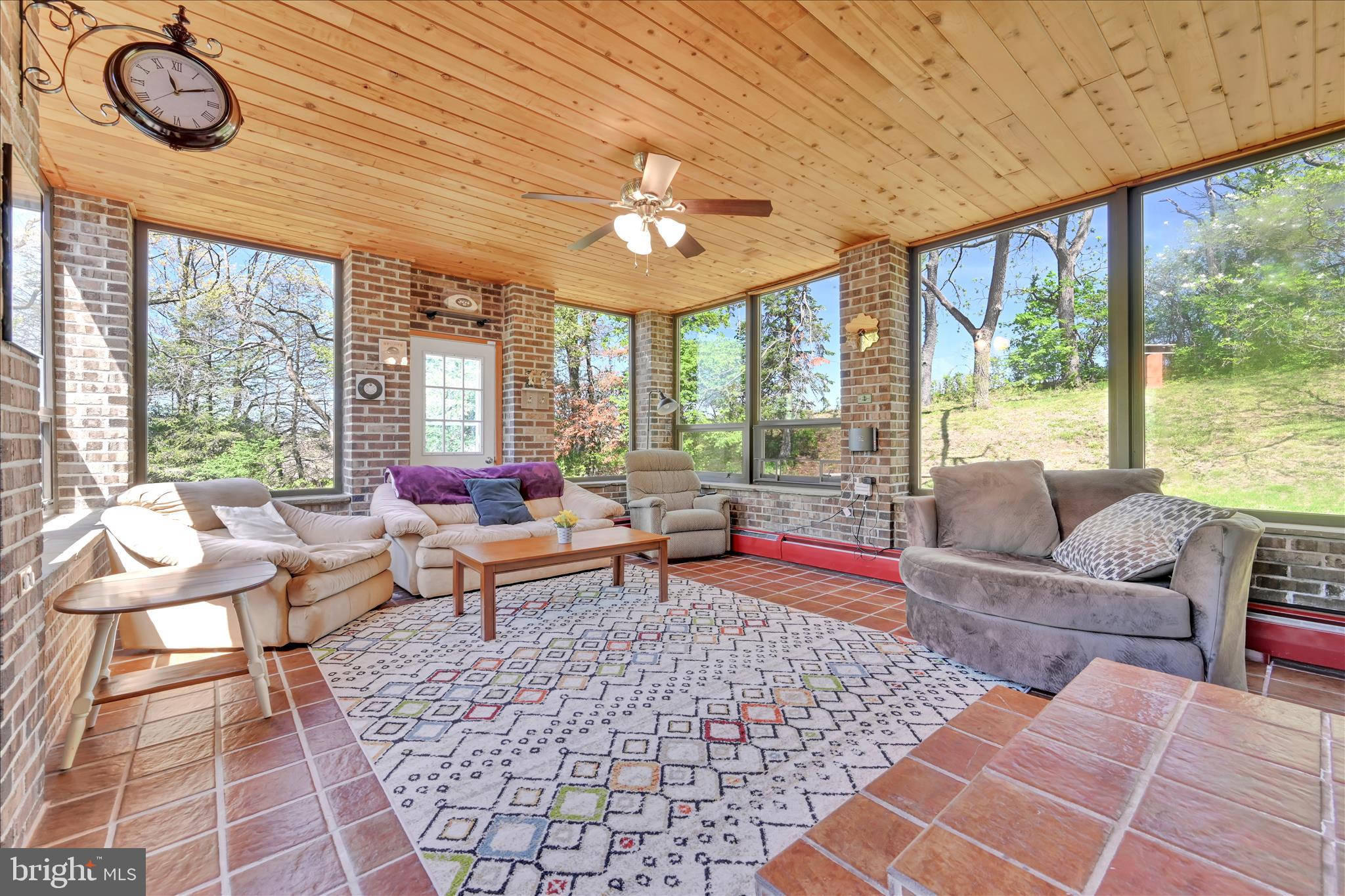 85 Gernants Church Road Leesport, PA 19533 - Photo 10 of 43 a living room with furniture and a large window