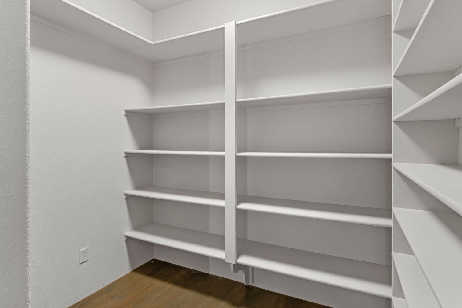 5724 Parker Road Modesto, CA 95357 - Photo 17 of 69 a view of walk in closet with empty racks