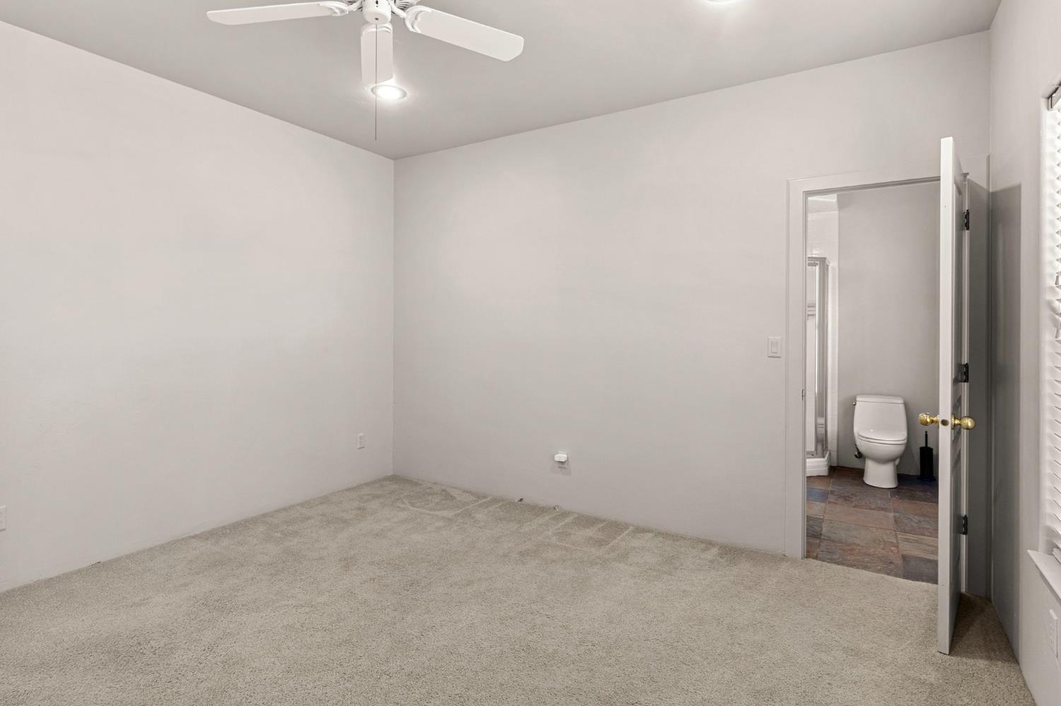 5724 Parker Road Modesto, CA 95357 - Photo 21 of 69 a view of room with a ceiling fan