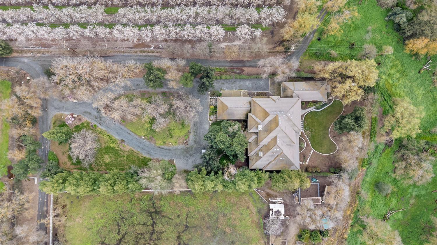 5724 Parker Road Modesto, CA 95357 - Photo 61 of 69 an aerial view of residential house with outdoor space and trees all around
