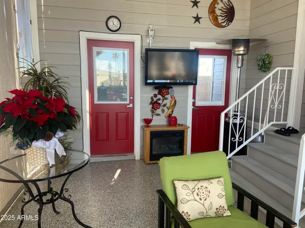 a utility room with cabinets washer and dryer