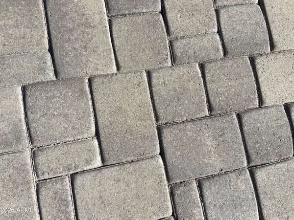 a view of a tall building with a yard